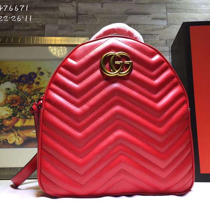 G*u*i backpacks